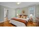 Bright bedroom with hardwood floors and ample natural light from large windows at 1801 Wilmore Dr, Charlotte, NC 28203