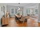 Open dining room with hardwood floors and abundant natural light at 1801 Wilmore Dr, Charlotte, NC 28203