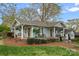 Charming home with a landscaped front yard and inviting front porches at 1801 Wilmore Dr, Charlotte, NC 28203