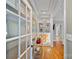 Entryway with hardwood floors, built in shelving, and an abundance of natural light at 1801 Wilmore Dr, Charlotte, NC 28203