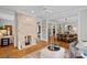 Spacious living room featuring a stone fireplace and hardwood floors at 1801 Wilmore Dr, Charlotte, NC 28203