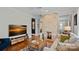 Inviting living room with stone fireplace, hardwood floors, and modern decor at 1801 Wilmore Dr, Charlotte, NC 28203