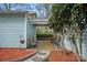Charming patio area with comfortable seating, stylish rug, and serene landscaping, perfect for outdoor relaxation at 1801 Wilmore Dr, Charlotte, NC 28203