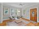 Cozy sitting area with plenty of natural light and comfortable seating at 1801 Wilmore Dr, Charlotte, NC 28203
