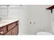 Bright bathroom featuring a vanity with storage, and modern fixtures, with white walls at 1828 Aston Mill Pl, Charlotte, NC 28273