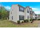 Exterior of home showcasing the vinyl siding and green lawn at 1828 Aston Mill Pl, Charlotte, NC 28273