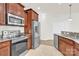 Kitchen featuring stainless steel appliances and granite countertops at 1828 Aston Mill Pl, Charlotte, NC 28273