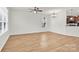 View of spacious living room with wood floors and neutral walls at 1828 Aston Mill Pl, Charlotte, NC 28273