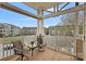 Relaxing balcony setting with outdoor seating and scenic views of the surrounding neighborhood landscape at 18742 Nautical Dr # 301, Cornelius, NC 28031