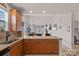 Gourmet kitchen with an island, granite countertops, and a seamless transition into the inviting living space at 18742 Nautical Dr # 301, Cornelius, NC 28031