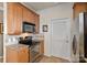 Functional kitchen featuring stainless steel appliances, granite countertops, and ample cabinet storage at 18742 Nautical Dr # 301, Cornelius, NC 28031
