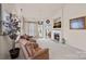 Cozy living room featuring a fireplace, plush seating, and ample natural light, creating a comfortable ambiance at 18742 Nautical Dr # 301, Cornelius, NC 28031
