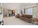Inviting living room with open floor plan, comfortable sofas, and easy access to the adjacent kitchen at 18742 Nautical Dr # 301, Cornelius, NC 28031