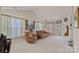 Spacious living room with vaulted ceilings, comfortable seating, and large windows offering plenty of natural light at 18742 Nautical Dr # 301, Cornelius, NC 28031