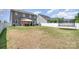 Expansive backyard featuring a large trampoline, and outdoor dining under a gazebo on the paver patio at 190 Silverspring Pl, Mooresville, NC 28117