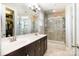 This bathroom features a double-sink vanity and tile shower with glass doors at 190 Silverspring Pl, Mooresville, NC 28117