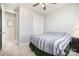 This bedroom features a carpeted floor, ceiling fan, and closet at 190 Silverspring Pl, Mooresville, NC 28117