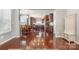 Open dining area with hardwood floors and access to the kitchen at 190 Silverspring Pl, Mooresville, NC 28117