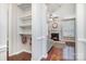 Open-concept living area featuring hardwood floors, fireplace, and neutral paint at 190 Silverspring Pl, Mooresville, NC 28117