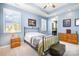 This main bedroom offers a trey ceiling, carpeted floor, and shuttered windows at 190 Silverspring Pl, Mooresville, NC 28117