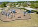 Community playground offering various play structures, a picnic area, and open space, set against a backdrop of residential homes at 190 Silverspring Pl, Mooresville, NC 28117