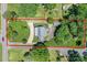 An aerial view of the property showing the house and the surrounding lot at 203 Mt Holly Huntersville Rd, Huntersville, NC 28078