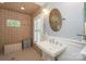A full bathroom with a shower and single sink at 203 Mt Holly Huntersville Rd, Huntersville, NC 28078