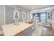 Open-concept kitchen and dining area, perfect for entertaining guests at 203 Mt Holly Huntersville Rd, Huntersville, NC 28078