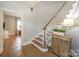 Elegant entryway showcasing a staircase, hardwood floors, and stylish decor, great first impression at 203 Mt Holly Huntersville Rd, Huntersville, NC 28078