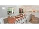 Bright kitchen flows into dining room with stainless steel appliances and ample counter space at 203 Mt Holly Huntersville Rd, Huntersville, NC 28078