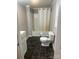 Bathroom features a tub with shower and updated fixtures at 211 W 2Nd St, Kershaw, SC 29067