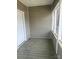 A well-lit porch that provides a welcoming entrance to the home at 211 W 2Nd St, Kershaw, SC 29067