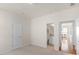 Bedroom with carpet, featuring an ensuite bathroom and dining area at 2136 Ashley River Rd, Waxhaw, NC 28173