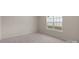 Bedroom with carpet, window, base trim and electrical outlets at 2136 Ashley River Rd, Waxhaw, NC 28173