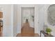Inviting entryway with hardwood floors, decorative niche, and views of the living space at 2136 Ashley River Rd, Waxhaw, NC 28173