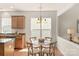 Bright kitchen featuring a breakfast nook with an eat in table at 2136 Ashley River Rd, Waxhaw, NC 28173