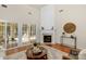 This living room has a fireplace and sliding doors at 2136 Ashley River Rd, Waxhaw, NC 28173