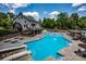 Large pool in a community with waterslides, playground and lots of seating at 2136 Ashley River Rd, Waxhaw, NC 28173