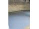 Clean, well-maintained garage floor with a smooth, speckled epoxy coating and insulated walls at 214 Creek View Rd, Mooresville, NC 28117
