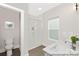 Well-lit bathroom features a glass-enclosed shower and a modern vanity with stylish fixtures at 218 Lacewing Dr # 41, Charlotte, NC 28214