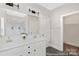 Double sinks and a large mirror enhance this bathroom's spaciousness and functionality at 218 Lacewing Dr # 41, Charlotte, NC 28214