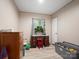 Bedroom with a small desk, toys, and natural light at 2234 Emerald Mine Rd, Shelby, NC 28152