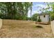 Expansive backyard featuring a newly installed wooden fence, providing privacy and security at 2512 Remington St, Charlotte, NC 28216
