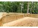 Large backyard featuring a wooden deck and a privacy fence, perfect for outdoor gatherings at 2512 Remington St, Charlotte, NC 28216