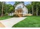 Beautiful new construction home featuring a spacious driveway and well-maintained lawn at 2512 Remington St, Charlotte, NC 28216