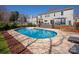 Beautiful backyard with in-ground pool, deck, and privacy fence at 2532 Annecy Dr, Matthews, NC 28105