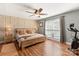 Bright bedroom featuring hardwood floors and a large window at 2532 Annecy Dr, Matthews, NC 28105