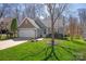 Charming single-Gathering home with a well-maintained lawn, attached garage, and appealing neutral-toned exterior at 2532 Annecy Dr, Matthews, NC 28105