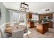 Open concept kitchen and dining area with pool views at 2532 Annecy Dr, Matthews, NC 28105