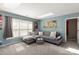 Comfortable living room with a skylight and a gray sectional at 2532 Annecy Dr, Matthews, NC 28105